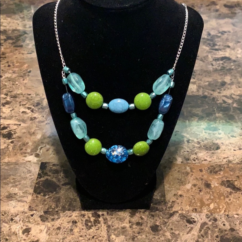 Blue/Green beaded necklace, with a silver chain.